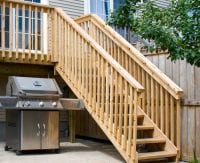 Wooden stairs & railings on balcony