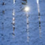 fence under a snow and sun