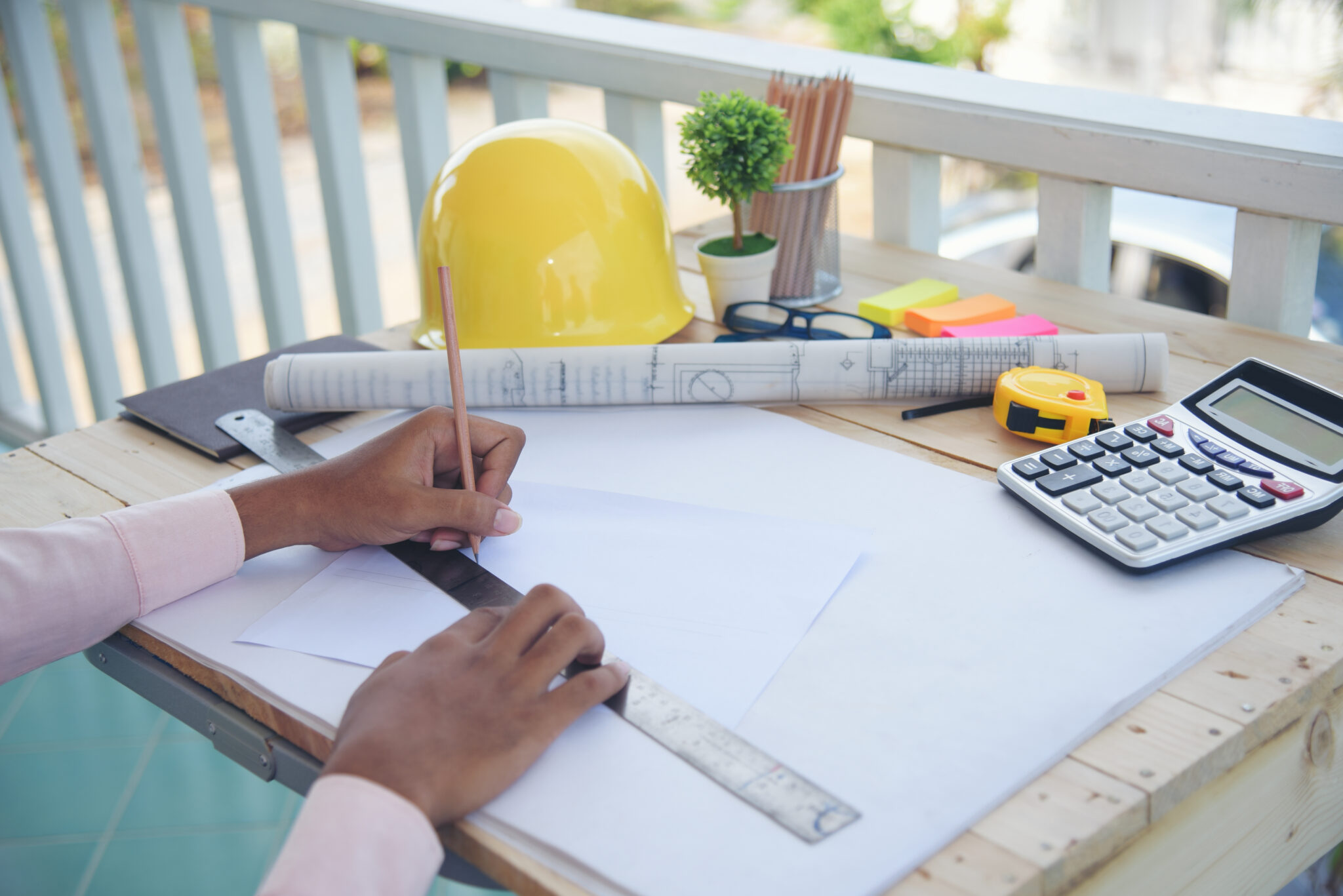 Contractor planning ahead for a deck and fence build for a client's yard.